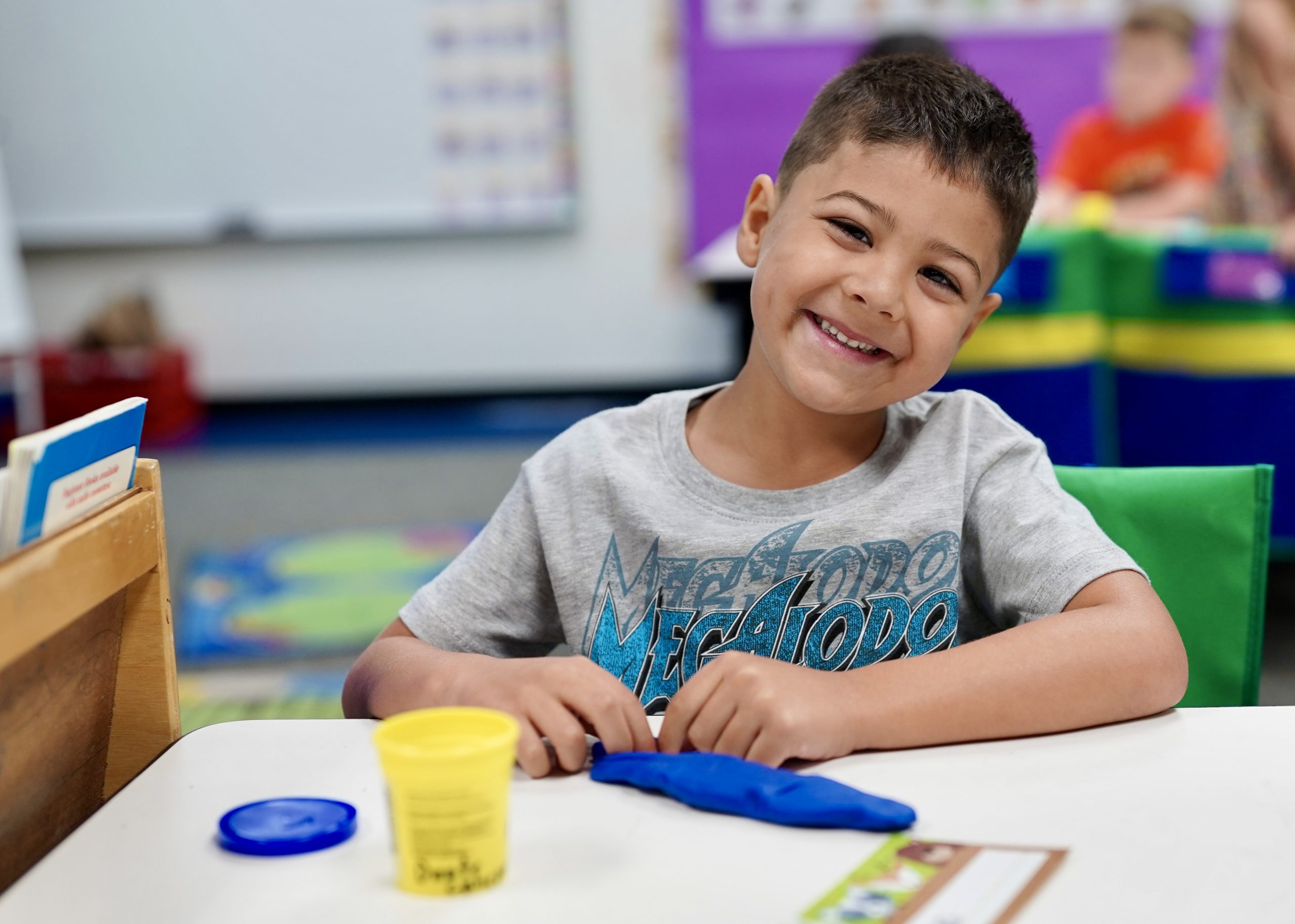Student sitting at desk in classroom