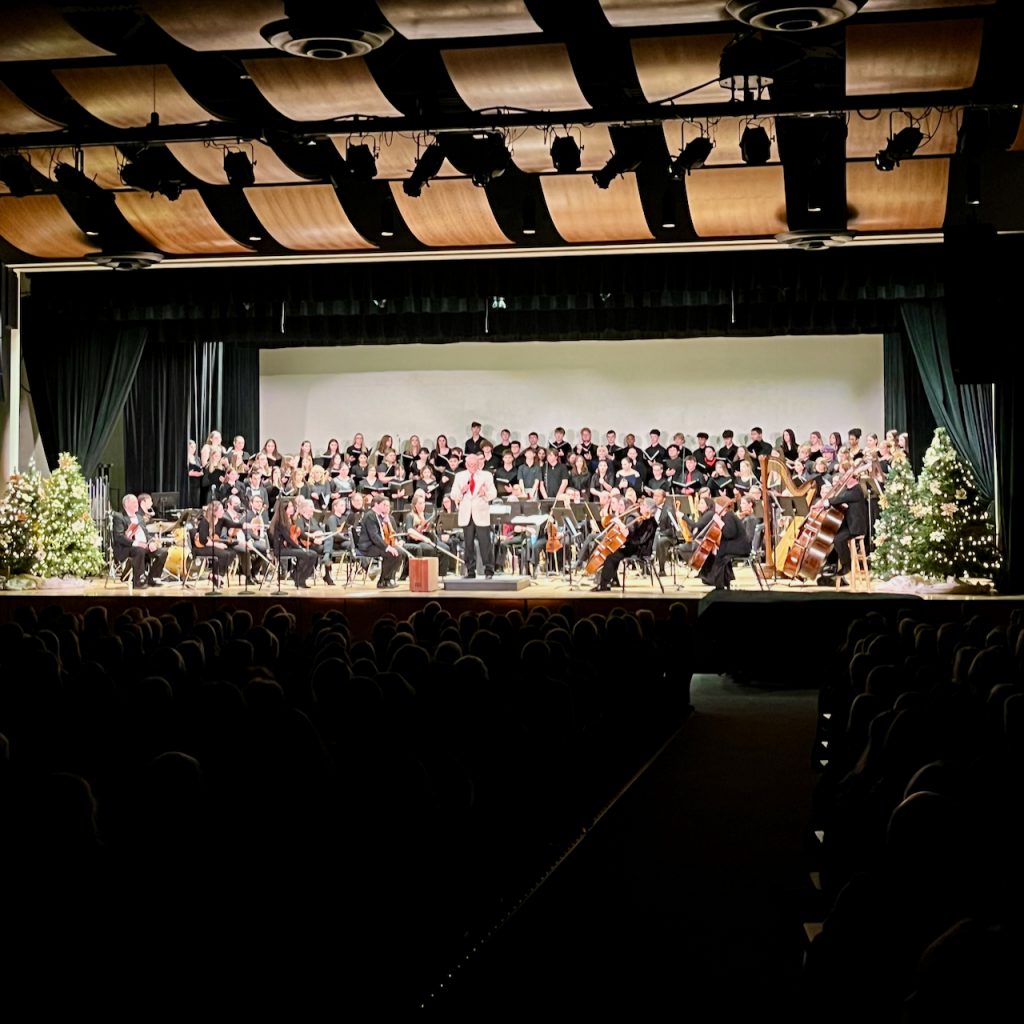 musicians playing on a stage
