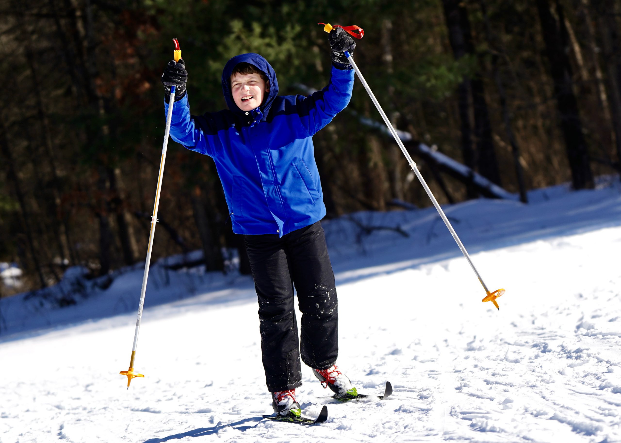 Students toss graduation caps at the 2025 graduation ceremony