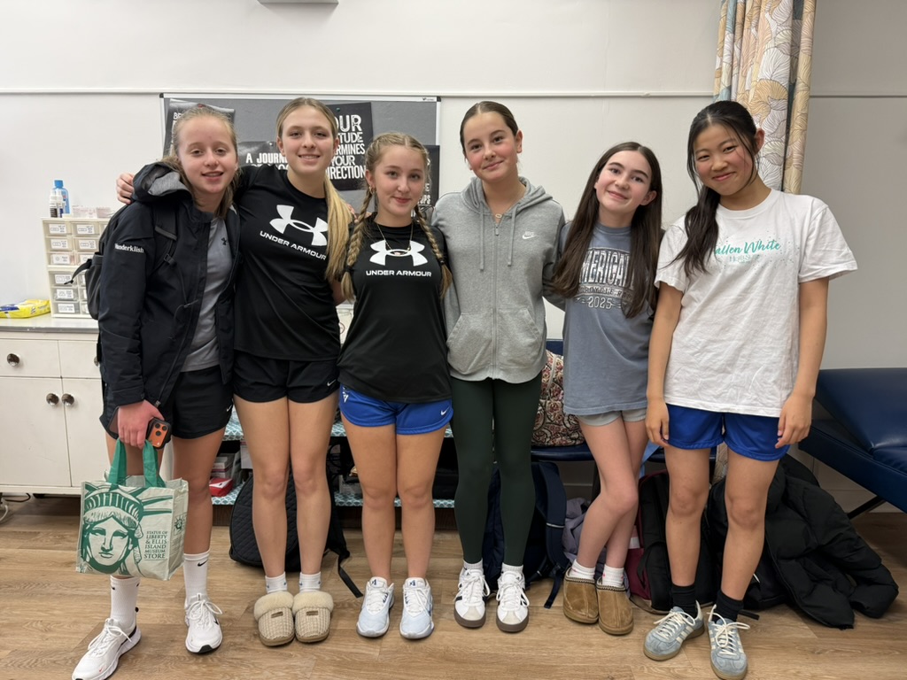 Senior students on a boat in Lake George