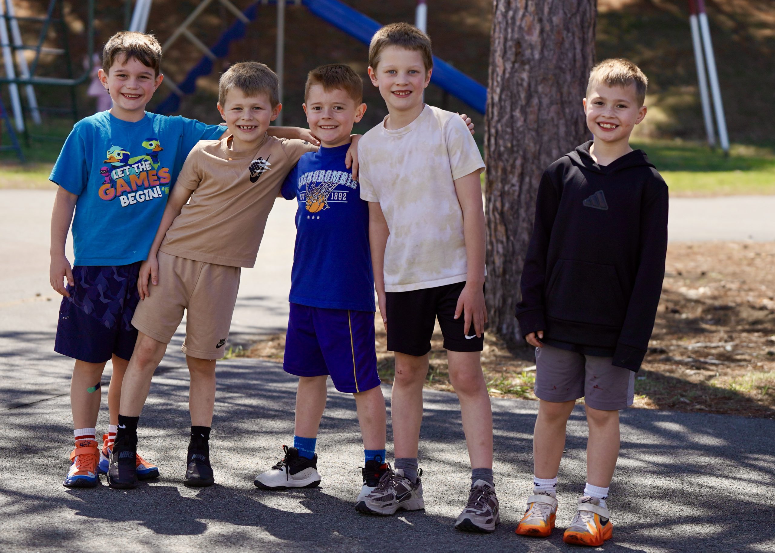 teacher and student high five each other