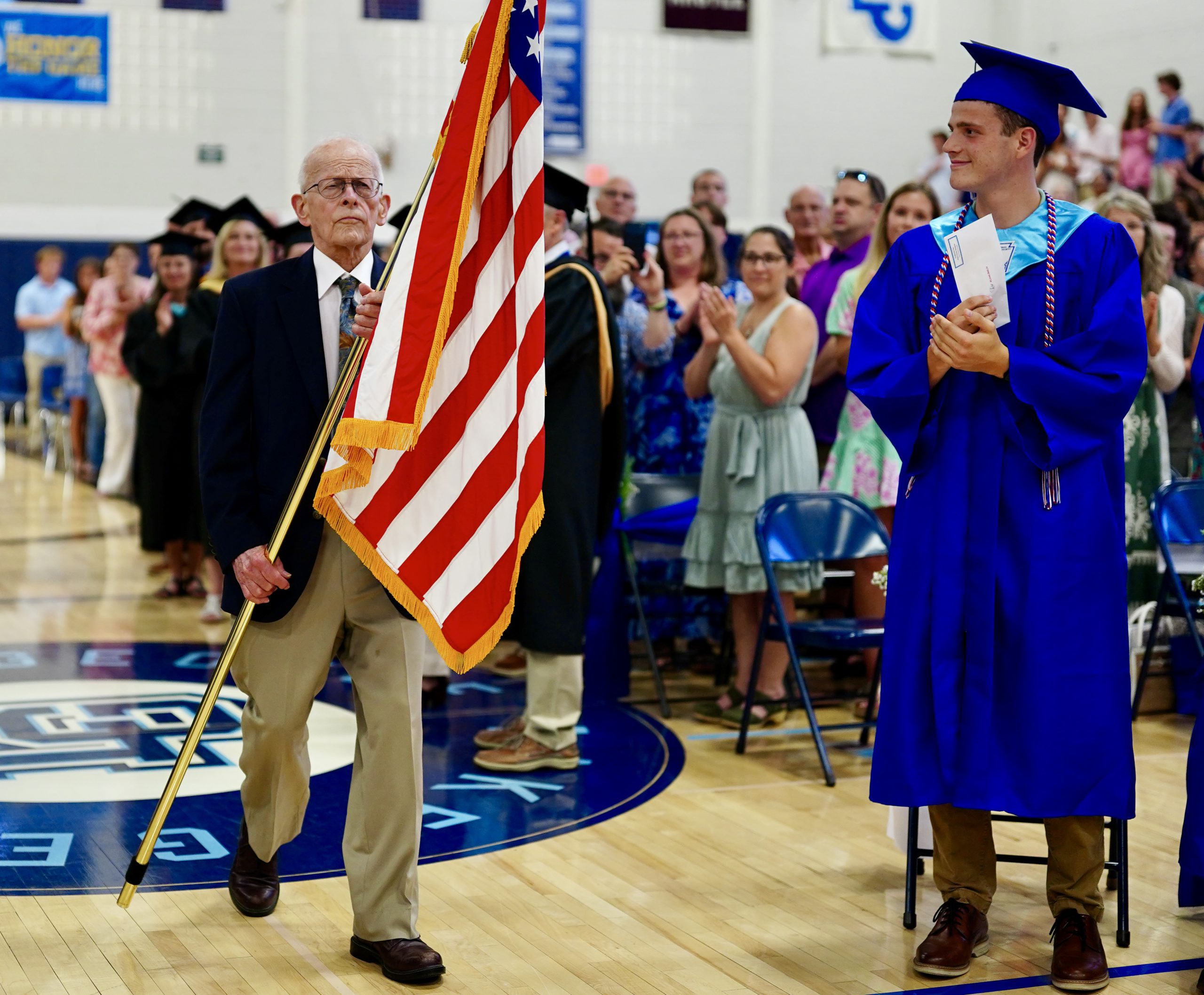 Students toss graduation caps at the 2025 graduation ceremony